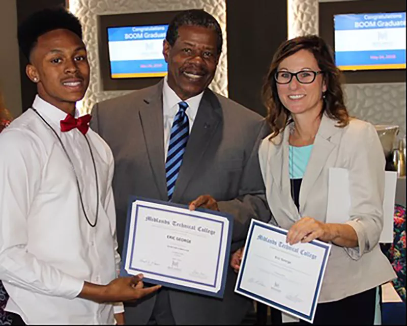 MTC President with two BOOM program students