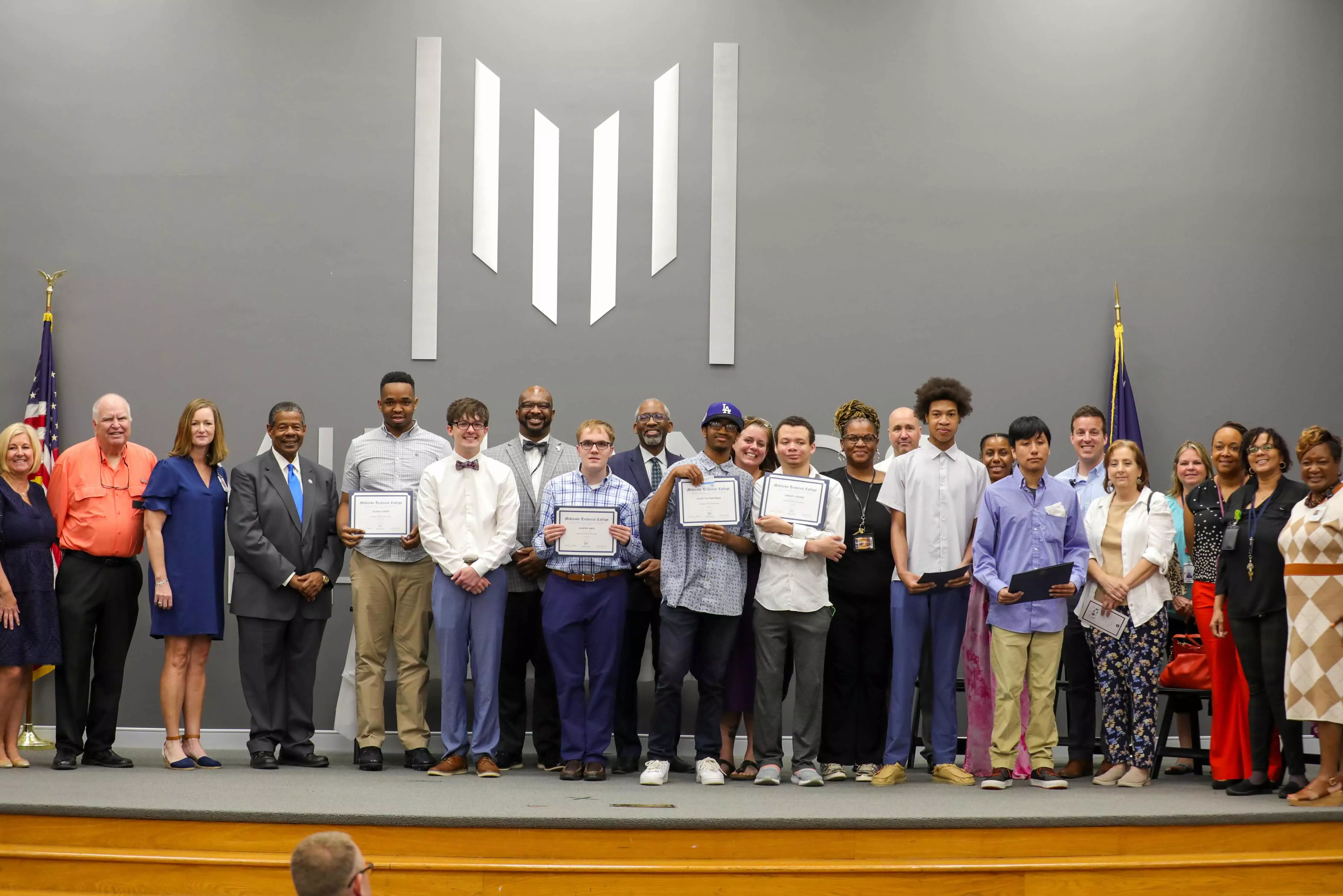 Graduates of the BOOM program pose for a picture. 